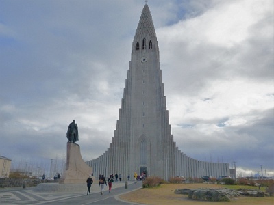 P1110622   Hallgrímskirkja  -  Lutheran (Church of Iceland) parish church in Reykjavik, Iceland. At 74.5 metres (244 ft) high, it is the largest church in Iceland and among the tallest structures in the country. In front a statue of explorer Leif Erikson given to Island in 1930 by the United States
