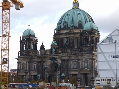 Berlin Cathedral  In 1940 the blast waves of Allied bombing blew part of the windows away. On 24 May 1944, a bomb of combustible liquids entered the roof lantern of the dome. The fire could not be extinguished at that unreachable section of the dome. So the lantern burnt out and collapsed into the main floor. Between 1949 and 1953 a temporary roof was built to enclose the building. On 9 May 1967 the then still undivided Evangelical Church of the Union decided a committee for the reconstruction of the Supreme Parish and Cathedral Church, then located in East Berlin. The government of the Eastern German Democratic Republic did not oppose the work of the committee due to the concomitant inflow of Deutsche Marks.