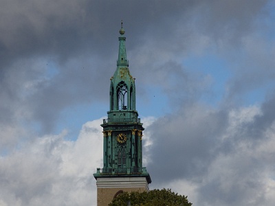 St. Mary's Church  St. Mary's Church, known in German as the Marienkirche, is a church in Berlin, Germany. It is located on Karl-Liebknecht-Straße (formerly Kaiser-Wilhelm-Straße) in central Berlin, near Alexanderplatz. The exact age of the original church site and structure is not precisely known, but it was first mentioned in German chronicles in 1292. It is presumed to date from earlier in the 13th century. The architecture of the building is now largely composed of comparatively modern restoration work which took place in the late 19th century and in the post-war period. The church was originally a Roman Catholic church, but has been a Lutheran Protestant church since the Protestant Reformation and a united protestant church since the Prussian Union of churches in 1817.