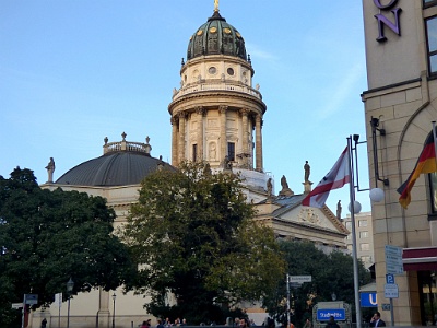 The German Church  The German Church (in German: Deutscher Dom)  is located to the south of the Gendarmenmarkt. It has a pentagonal structure and was designed by Martin Grünberg and built in 1708 by Giovanni Simonetti. This church belonged to the Lutheran community. It too was modified in 1785 by Carl von Gontard, who built the domed tower. The German Church was completely destroyed by fire in 1945, during World War II. After German reunification it was rebuilt, finished in 1993 and re-opened in 1996 as a museum of German history.