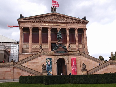 Old National Gallery  The Alte Nationalgalerie (Old National Gallery) in Berlin is a gallery showing a collection of Neoclassical, Romantic, Biedermeier, Impressionist and early Modernist artwork, part of the Berlin National Gallery, which in turn is part of the Staatliche Museen zu Berlin. It is the original building of the National Gallery, whose holdings are now housed in several additional buildings. It is situated on Museum Island, a UNESCO-designated World Heritage Site.