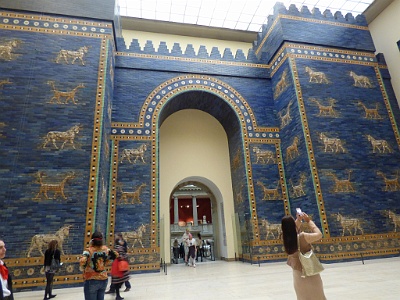 the Ishtar Gate of Babylon  The Pergamon Museum (German: Pergamonmuseum) is situated on the Museum Island in Berlin. The building was designed by Alfred Messel and Ludwig Hoffmann and was constructed over a period of twenty years, from 1910 to 1930. The Pergamon Museum houses monumental buildings such as the Pergamon Altar, the Ishtar Gate of Babylon, and the Market Gate of Miletus reconstructed from the ruins found in ancient Middle East.