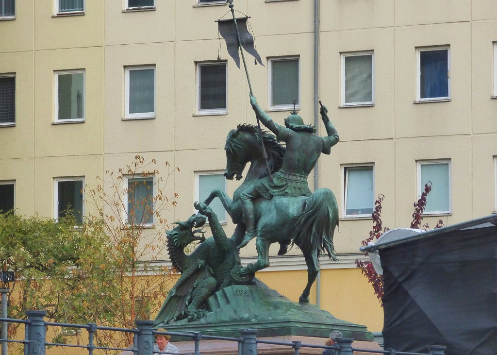 St. George fighting the dragon.