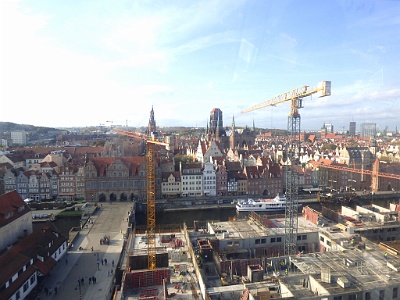 Gdansk Old Town - from Amber Sky  Gdańsk (German: Danzig)  is a Polish city on the Baltic coast. It is the capital of the Pomeranian Voivodeship, Poland's principal seaport and the centre of the country's fourth-largest metropolitan area. Gdańsk itself has a population of 460,427 (December 2012), making it the largest city in the Pomerania region of Northern Poland. The first written record thought to refer to Gdańsk is the vita of Saint Adalbert. Written in 999, it describes how in 997 Saint Adalbert of Prague baptised the inhabitants of urbs Gyddannyzc, "which separated the great realm of the duke [i.e. Boleslaw the Brave of Poland] from the sea." No further written sources exist for the 10th and 11th centuries. Based on the date in Adalbert's vita, the city celebrated its millennial anniversary in 1997