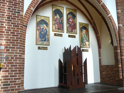 Academic Chapel  The chapel is occupied by a confessional . The chapel is composed of four paintings depicting the Fathers of the Church : Hieronymus , St. Augustine , St. Gregory and St. Ambrose . The paintings reproduced by Malgorzata Wodejszo are copies of the Altar of the Fathers of the Church - the work of Michael Pacher, made in 1463 for the monastery in Neustift near Brixen