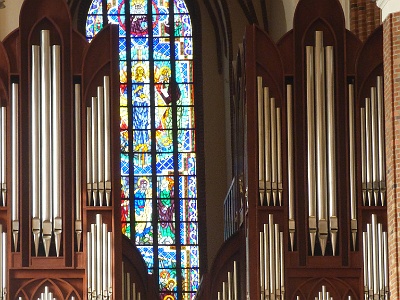 John Paul II - Organ Name  The most difficult problem in designing a solid body of the instrument was its design so that the 30m 2 stained glass window behind the Transfiguration stage was not covered. The main designer of the organ was Dariusz Zych. In March 2008 the assembly of organs in the cathedral was started. After completing the assembly work, the tuning process (organ intonation) took place for two months. The dedication of the organ and the name of John Paul II took place on June 15, 2008.