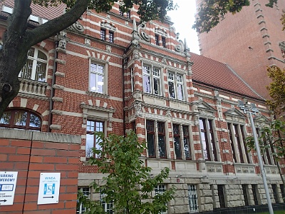 Voivodship Office on the Chrobry shafts  The building was not hurt during the bombings of Szczecin during World War II. The present building of the Regional Office was the first seat of Polish municipalities with Piotr Zaremba in the lead, who on April 30, 1945 ordered to raise the Poland flag on the building.[1]  In 1985, the building of the Regional Office has been entered in the register of monuments.[1]  In 2011, due to 100 years anniversary of existence, the building is planned to be made available to the public, including attractive tourist routes covering both underground (with the uncharted, flooded by water tunnel [inline] running in the direction of the Oder river) and towers (here with in turn a collection of gargoyle, gathered by Germans in unknown purpose can be admired