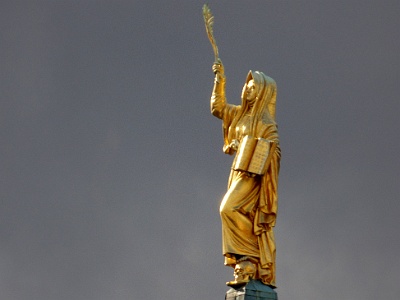 Statue on tower of French Dome in Gendarmenmarkt