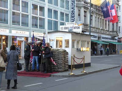 Checkpoint Charlie  Checkpoint Charlie became a symbol of the Cold War, representing the separation of East and West. Soviet and American tanks briefly faced each other at the location during the Berlin Crisis of 1961.