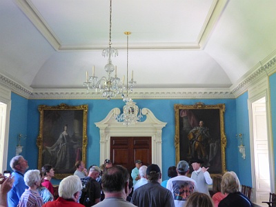 Formal Room  Under Lt. Gov. Robert Dinwiddie, from 1751 to 52, the residence was repaired and renovated, including the addition of a large rear addition featuring a ballroom. These are portraits of Queen Charlotte and George III .